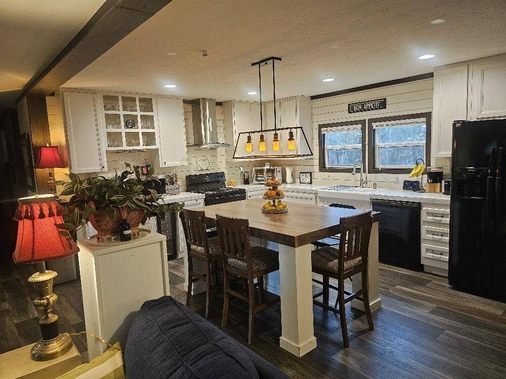 Dream kitchen has pantry and 4 pot drawers!