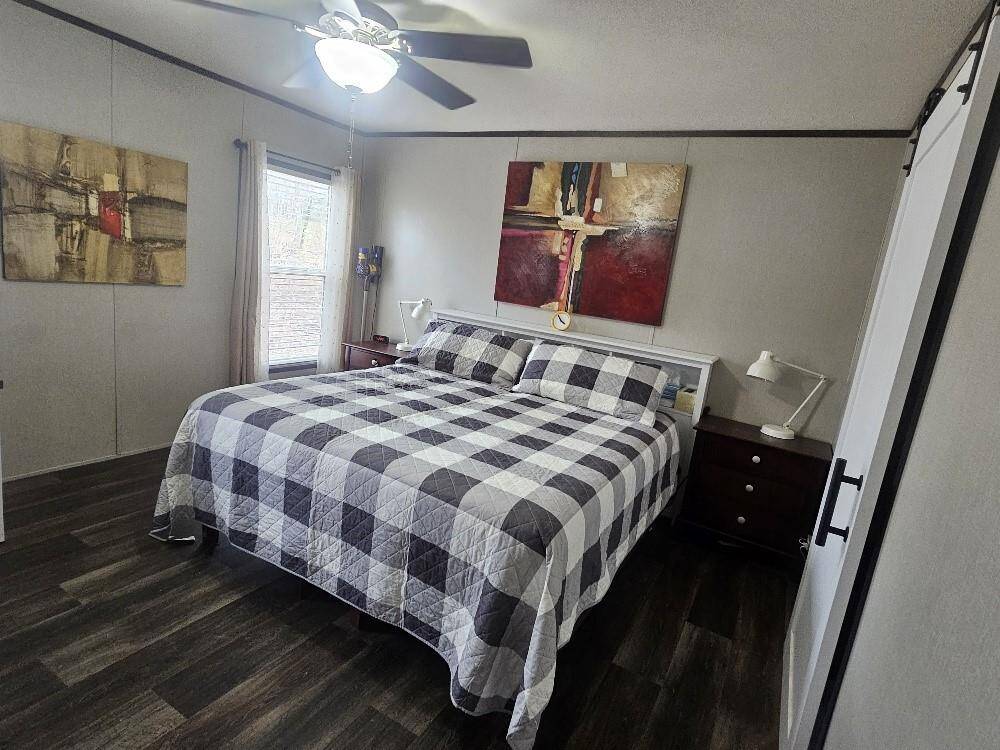 Two windows offer ample light to this cheery room.
