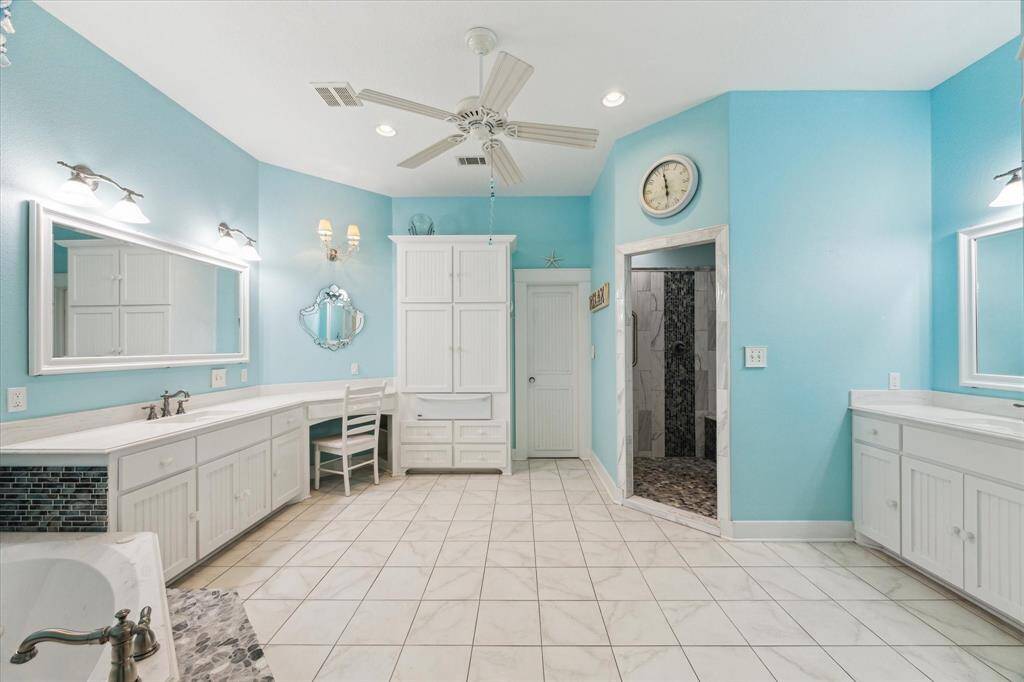primary bathroom with oversized shower, soaking tub and a towel/bathrobe warming drawer!!