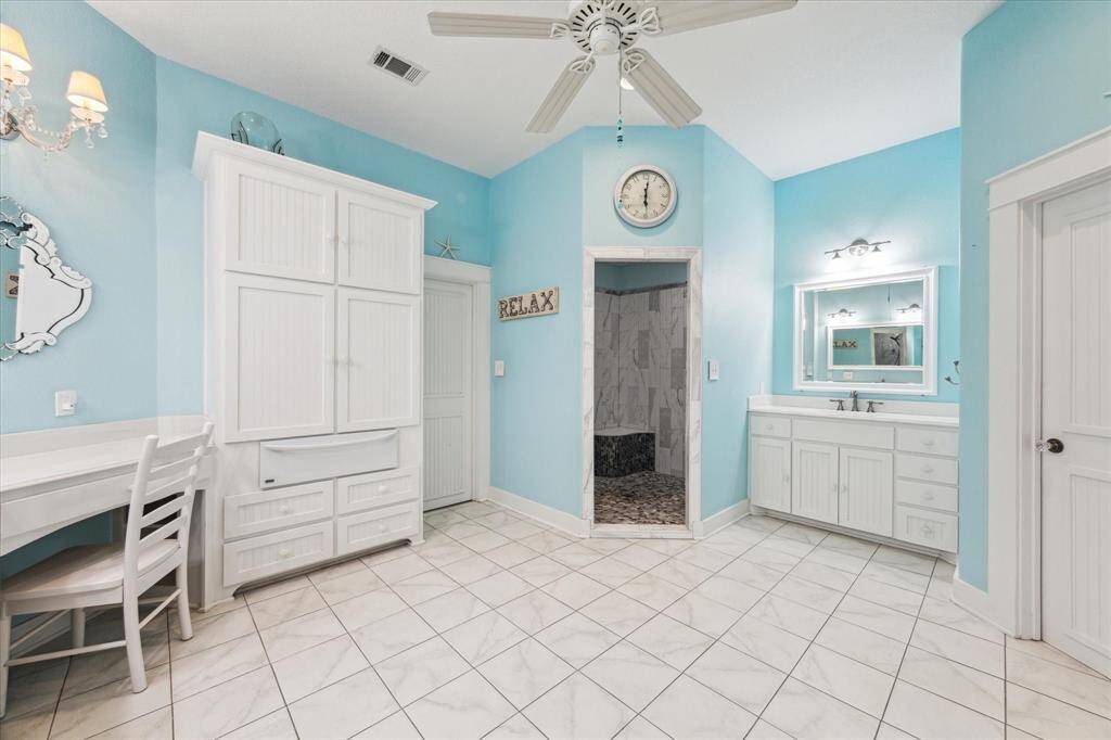 Large bathroom with gigantic walk in closet