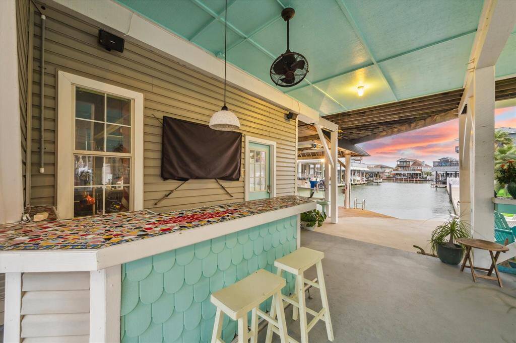 Entertaining bar area with a TV for watching sports or Ms. Racheal