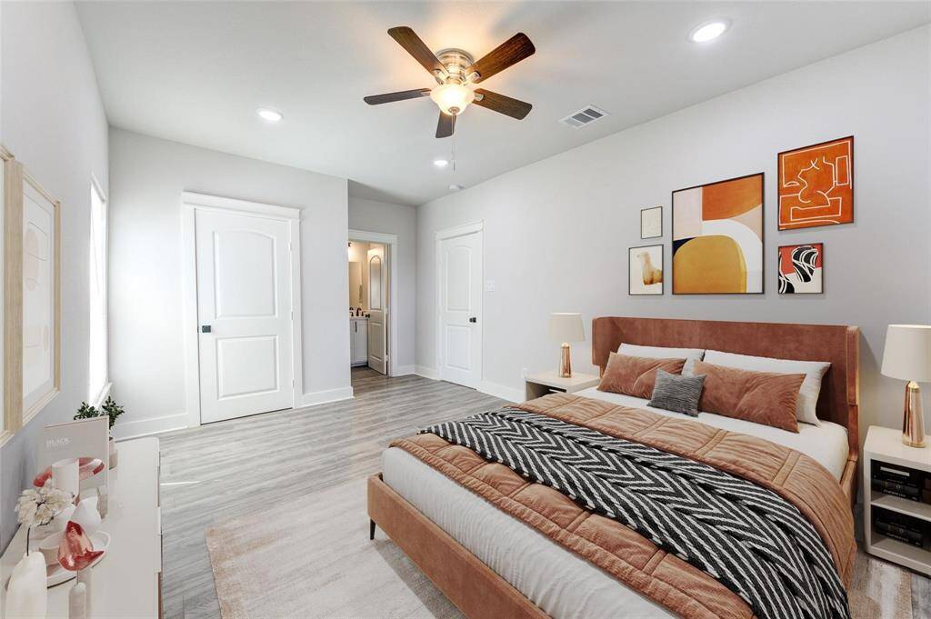 Modern bedroom with stylish virtual staging, featuring contemporary decor, sleek flooring, and ample natural light.