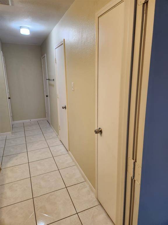 Master Bath with His/Hers Closet, private water closet, and towel closet