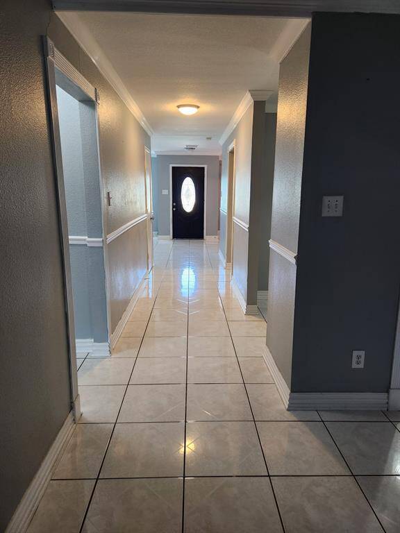 Living room hallway to view of entry