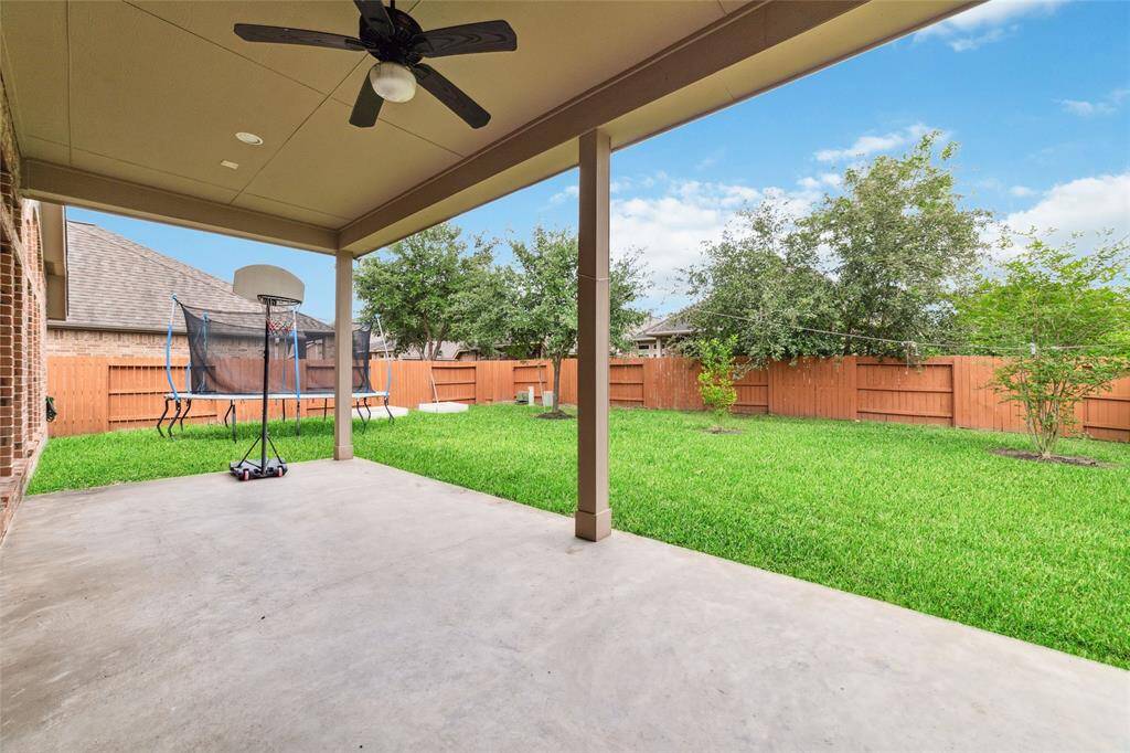 Expanded covered patio with ceiling fans are perfect for relaxing and entertaining