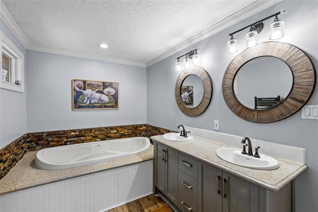 Soaking tub in the primary bathroom.