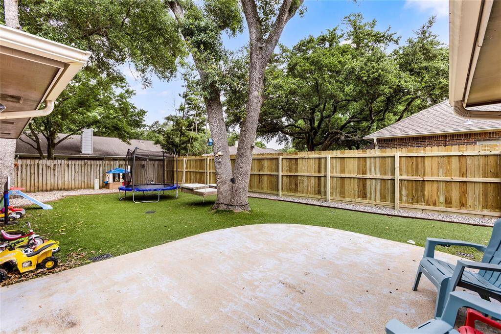 Dream backyard with no maintenance Astroturf!