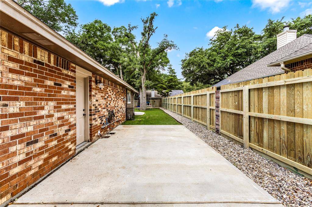 BRING YOUR RV OR BOAT! Concrete pad behind gates for storage.