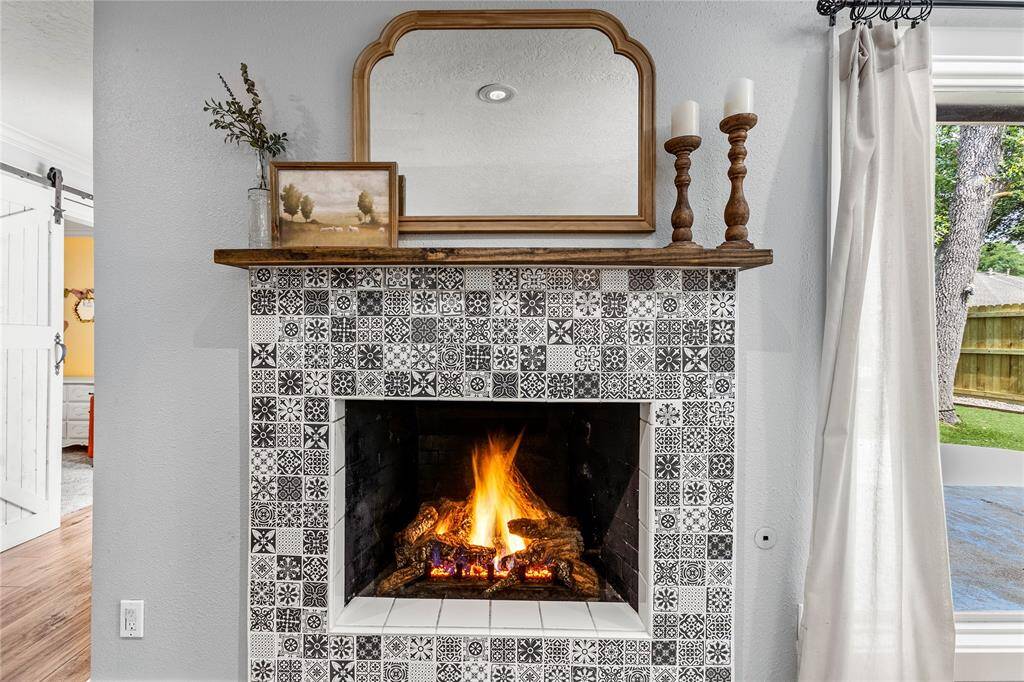 Custom tiled fireplace as focal point of the home.