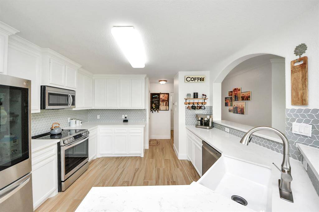 Light and bright with beautiful backsplash