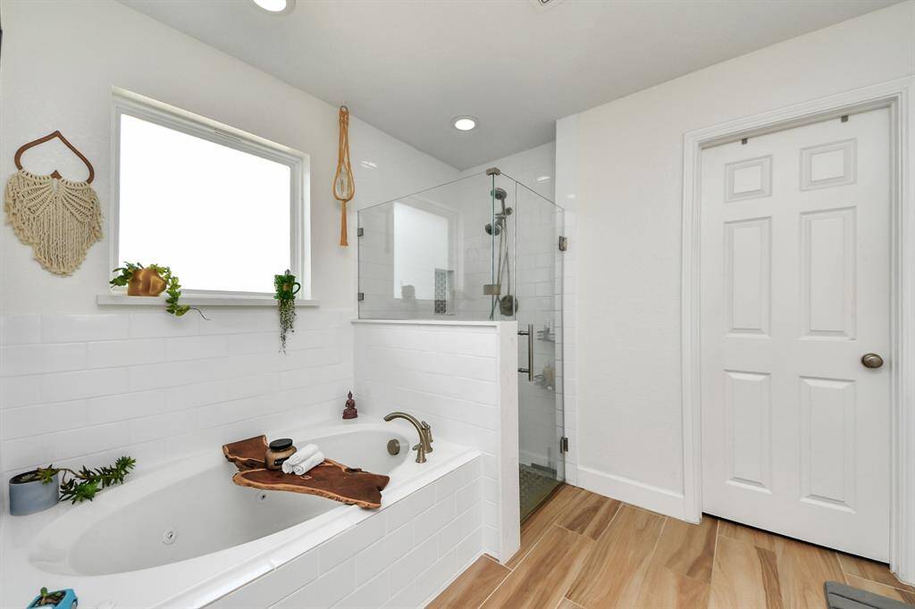 Custom shower surround AND a soaking tub!