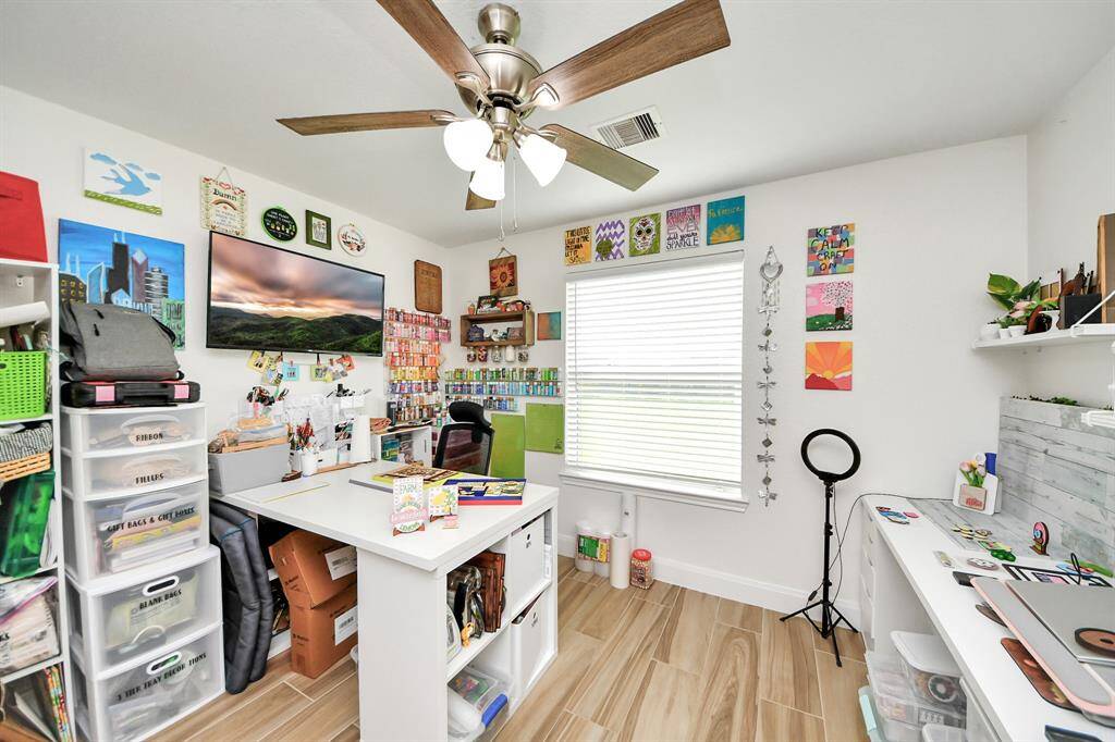 Bedroom #2 currently being used as a craft room