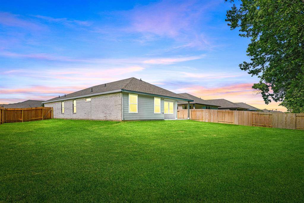 Whether you're envisioning a play area for the kids, a relaxing retreat for adults, or the ultimate outdoor entertaining space with patio furniture and a BBQ pit, this yard offers endless possibilities to make it your own.