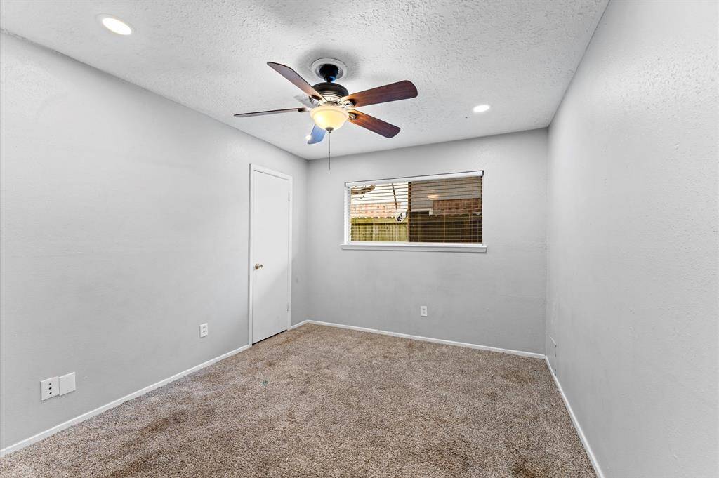 The hall bath was updated in 2023 to include granite counters, hardware, and framed mirrors.