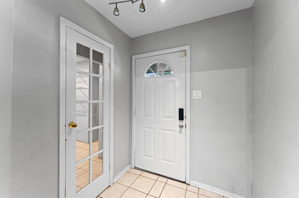 Just off the living room you'll find the kitchen and breakfast area with plenty of natural light.
