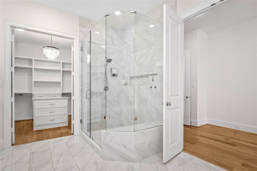 Enjoy the large glass walk-in shower.