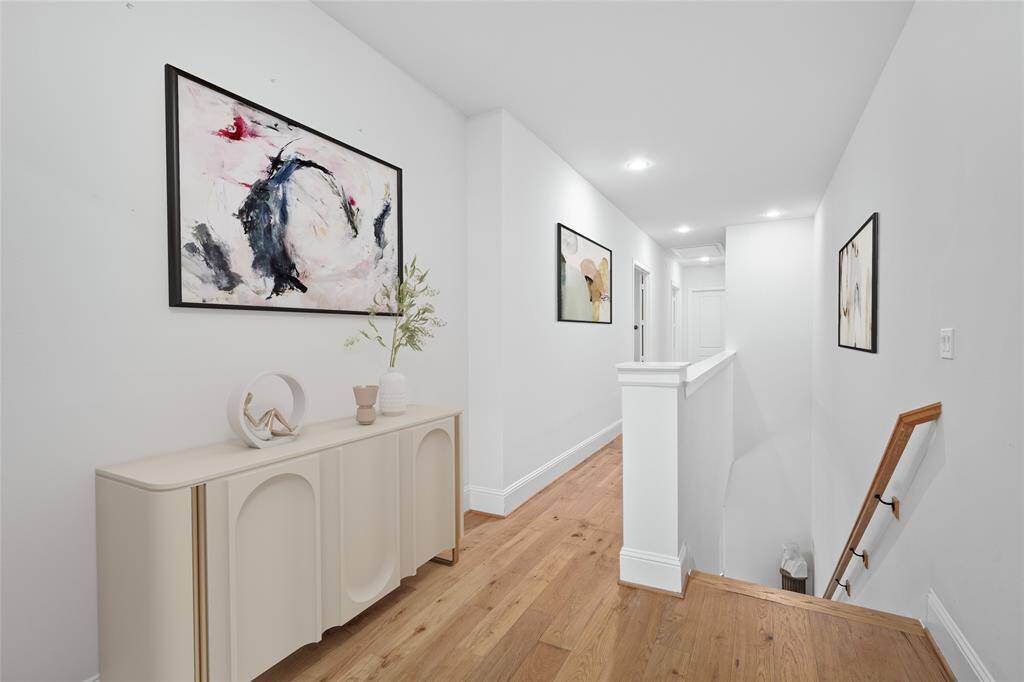 Down the hallway to the game room and other bedrooms.