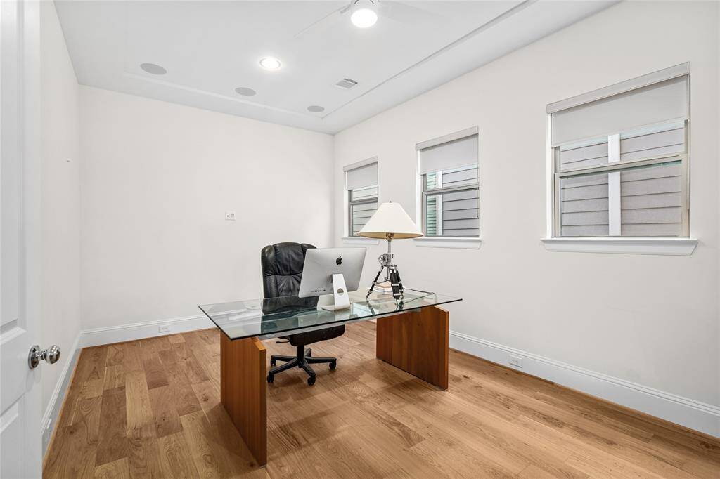 This spacious game room can also easily be converted into a home office, or even a forth bedroom.