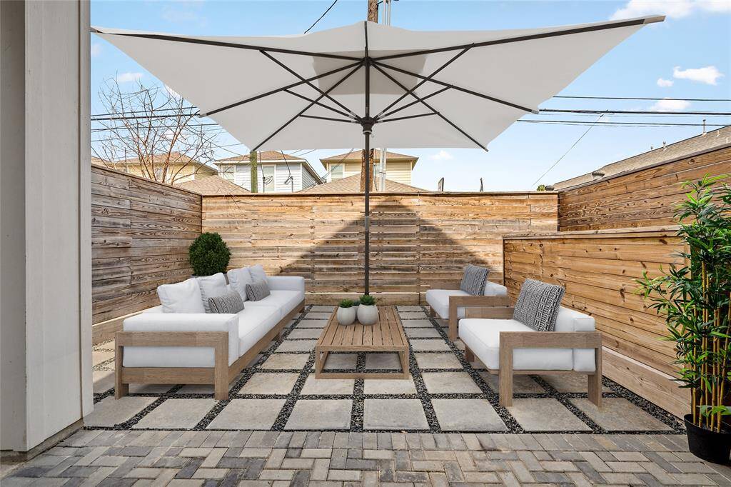 Large outside patio, perfect for entertaining guests in the summer or enjoying the cooler winter months. *Virtual staging has been added*