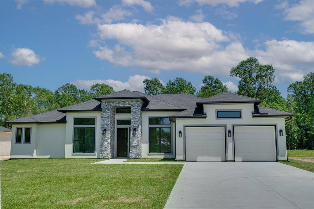 Gorgeous, Modern & Contemporary Home on 30,013. Sq. Ft. of Cleared Land.