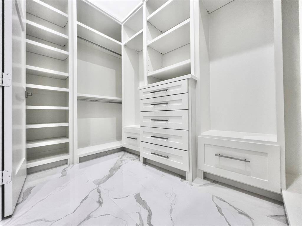 Primary Bedroom has 2 Spacious Walk-in Room Closets built California Style.