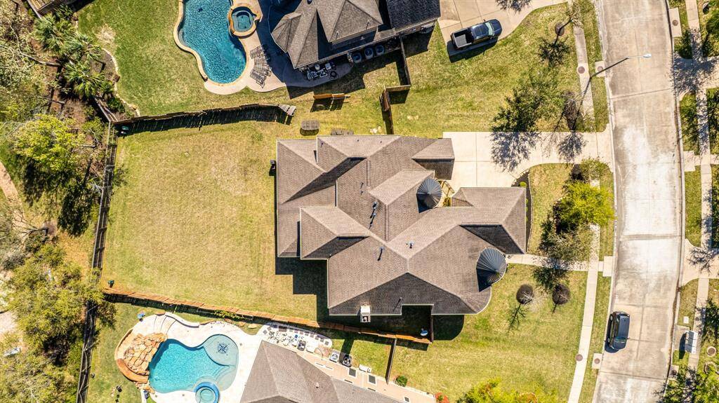 A directly overhead perspective reveals the sheer scale of the lot and its careful landscaping.