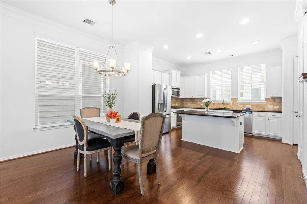 How beautiful are these hardwood floors and this light and bright kitchen? The tall ceilings make this room feel huge, and you'll really LOVE having TWO pantries and all appliances included.