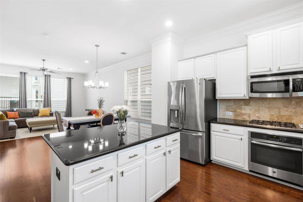 Who doesn't love a huge kitchen with stainless steel appliances? Don't forget about the two pantries and the gas stove.