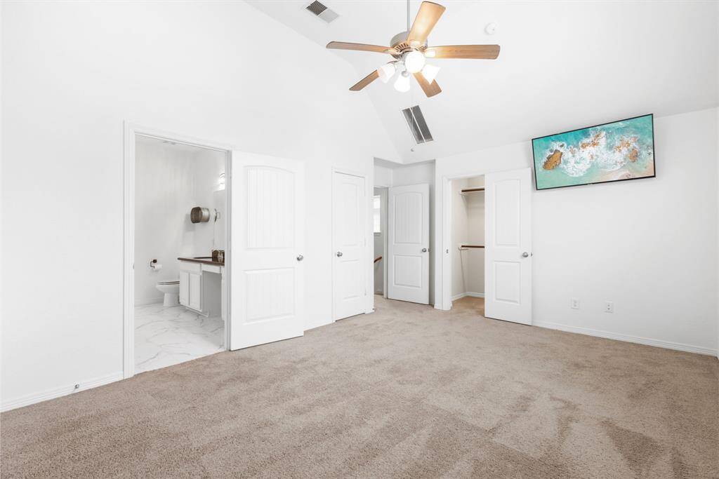 The HUGE primary bedroom can be found on the 3rd floor with two closets and a fully remodeled en-suite bath.