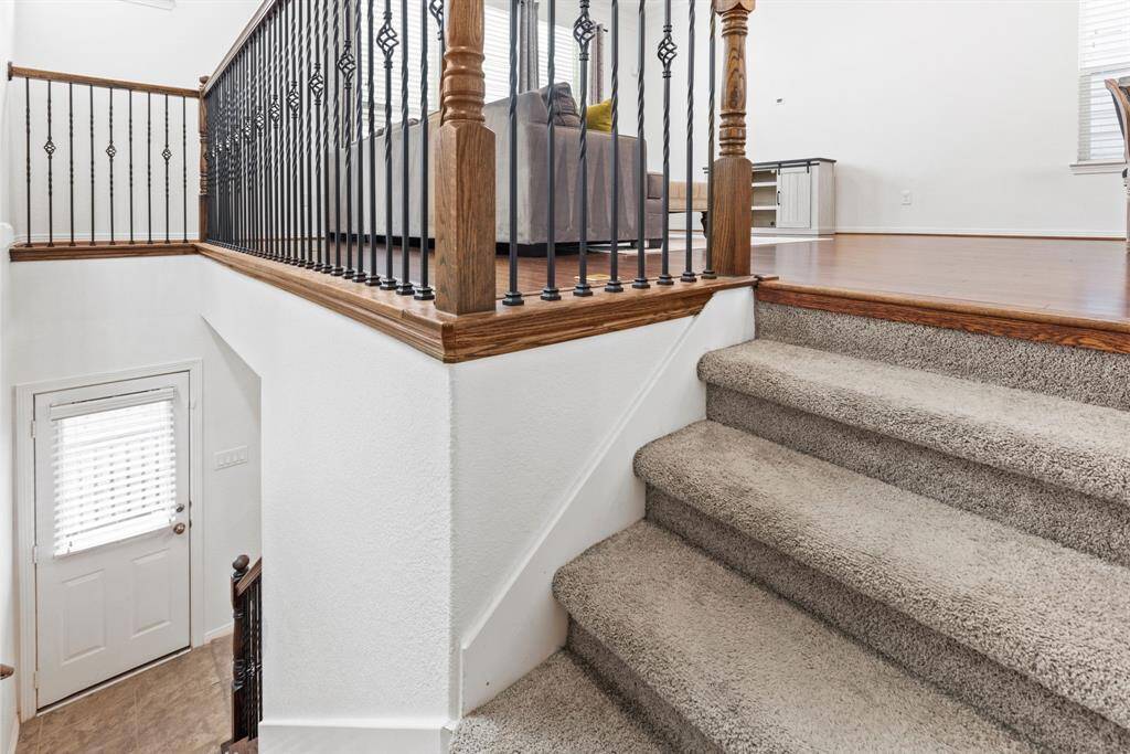 Off the main living room, on the first floor, you fill find the third bedroom/flex room.