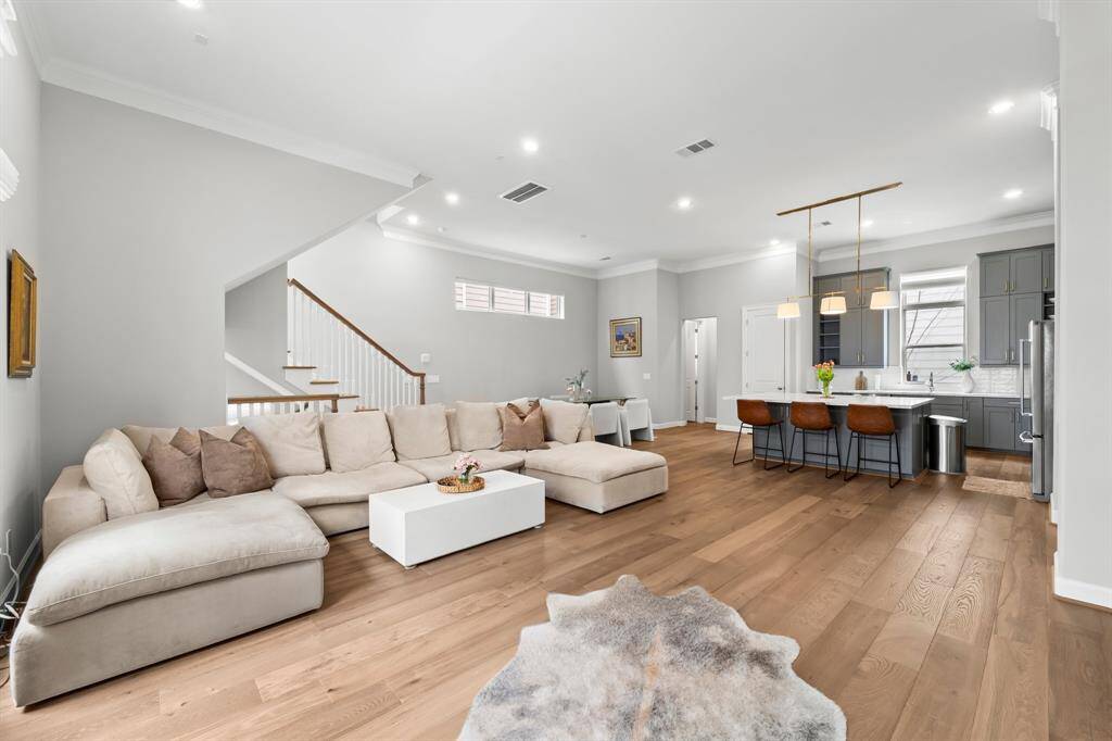 Discover the spacious elegance of 13-foot ceilings in the second-floor living area.