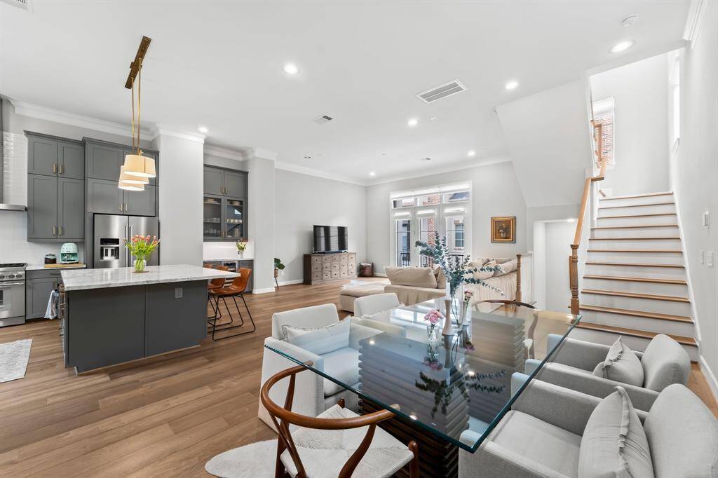Experience seamless living with a gourmet kitchen flowing into the dining and living areas.