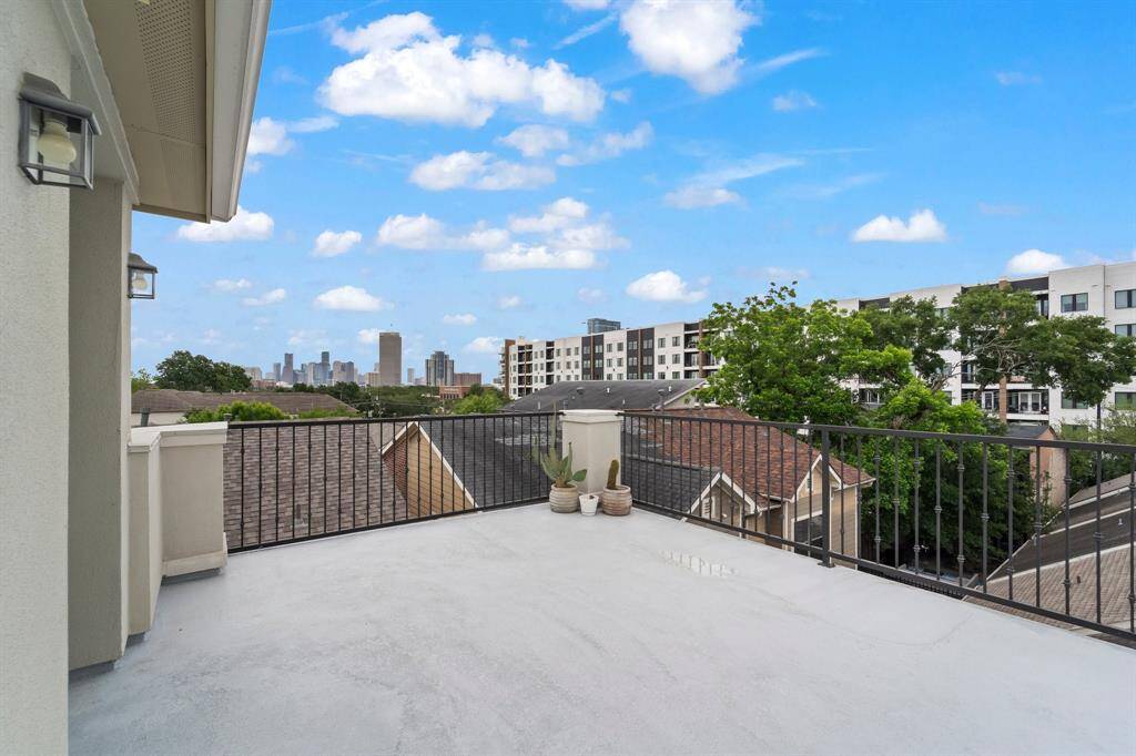 Enjoy breathtaking city views from your exclusive rooftop deck.