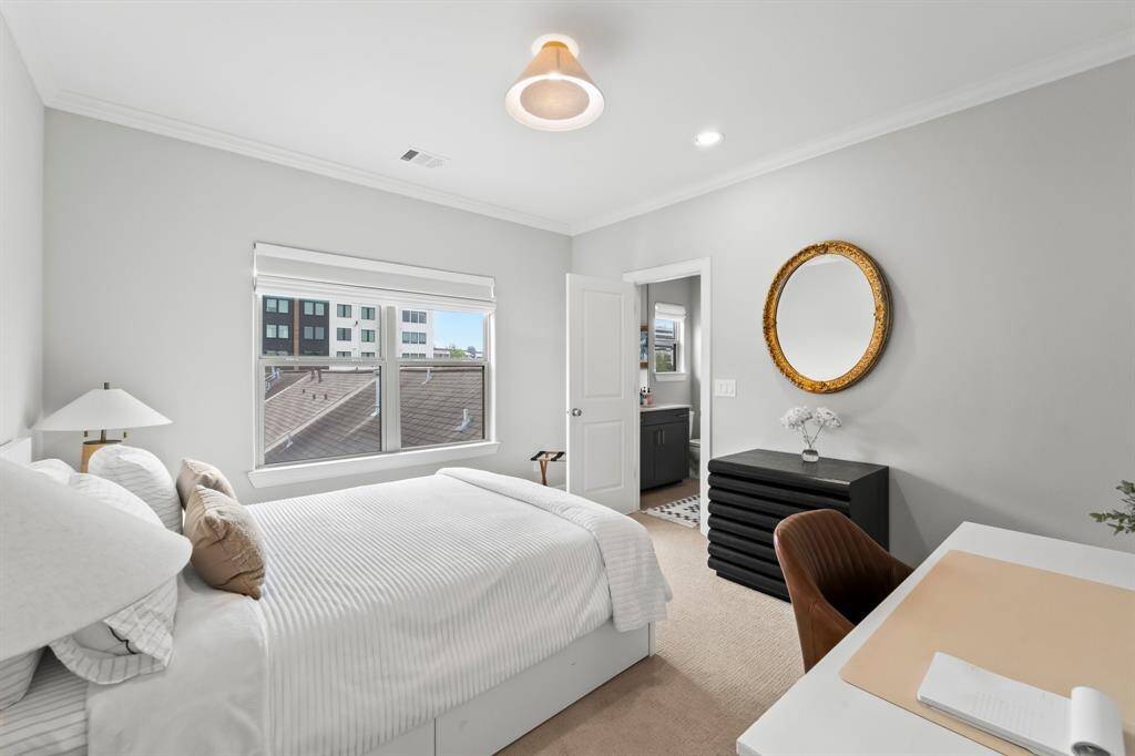 Inviting third-floor bedroom with private ensuite bathroom.