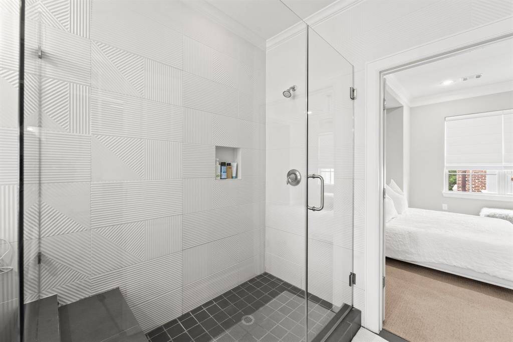 Spacious walk-in shower for a luxurious bathing experience.