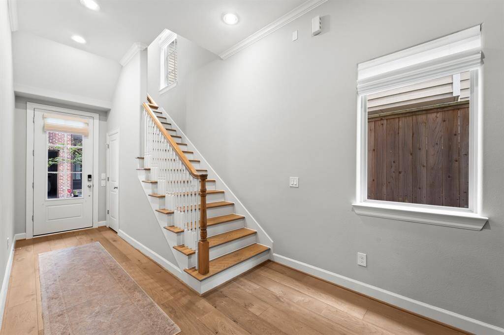 Welcoming foyer with ample storage closet.