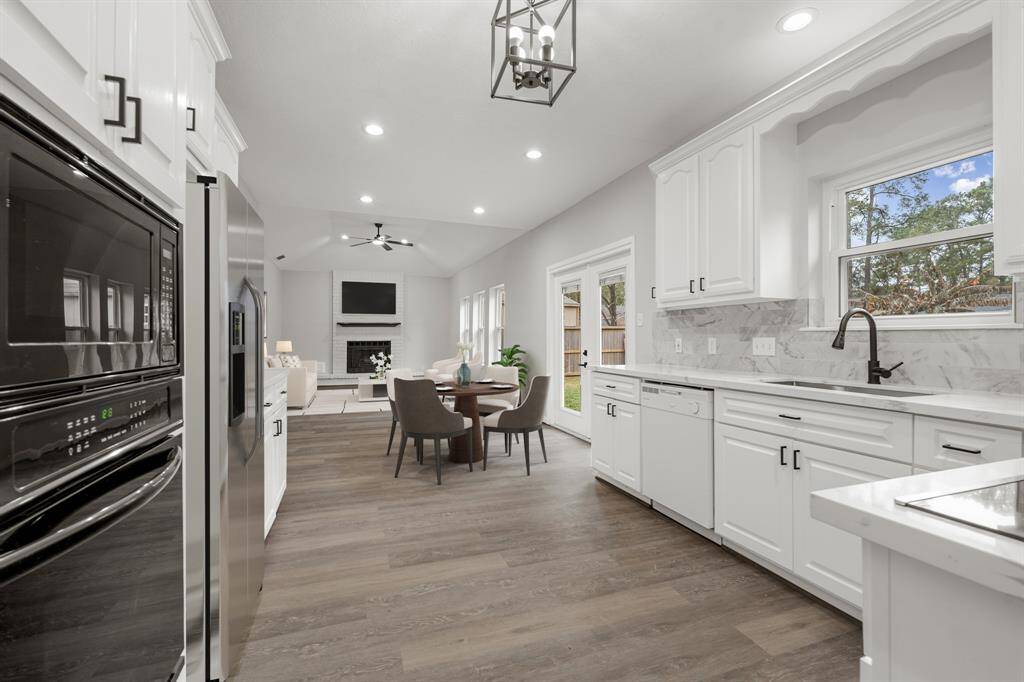 Virtually Staged: This fantastic kitchen and breakfast space creates an incredible open layout that make it easy to converse with others while whipping up a meal in the process.