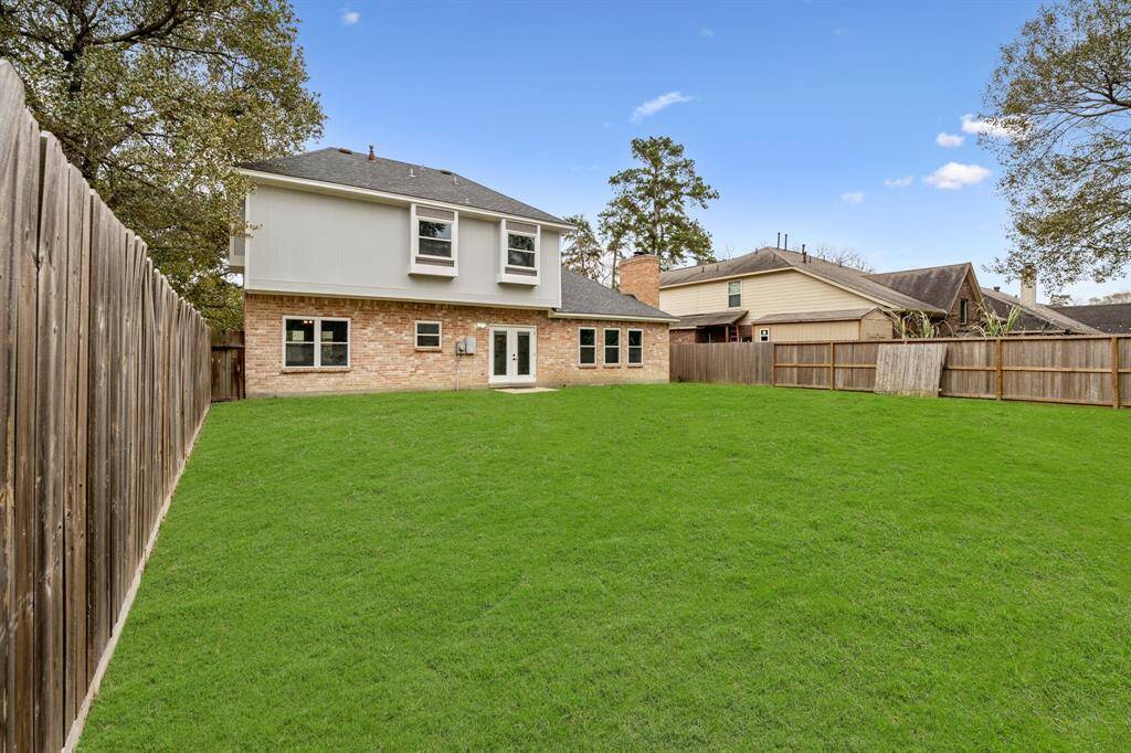This HUGE backyard is definitely not lacking on green space! Featuring a lush lawn, you'll have plenty of space to create your own paradise!