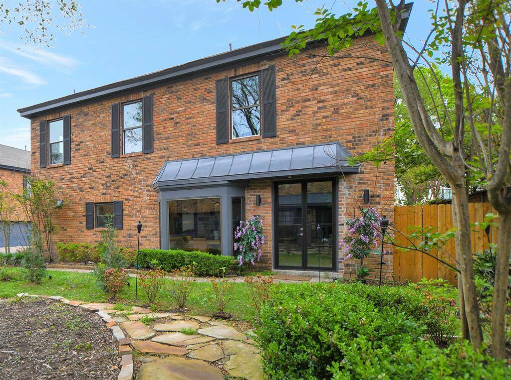 corner home with beautiful landscaping