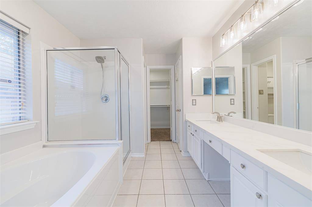 The Primary bathroom is so large, both you and your partner can both function at the same time.  Don't forget the large walk-in closet.