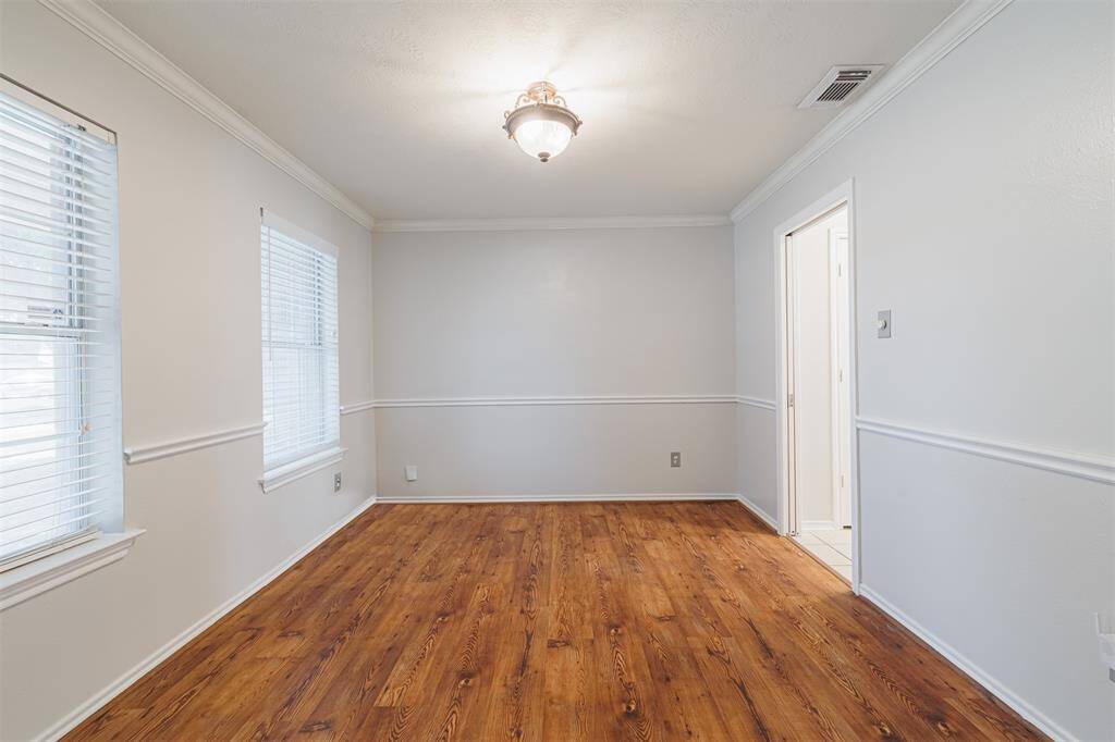 To the right, A sliding Door to the kitchen.