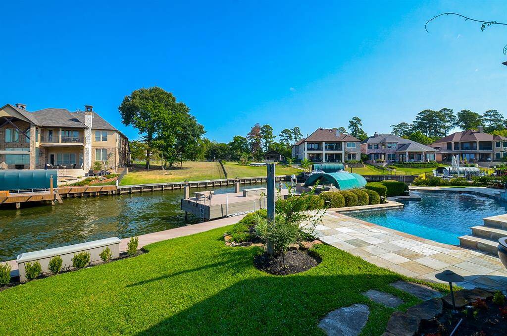 Home is located on the deeper end of Lake Conroe.
