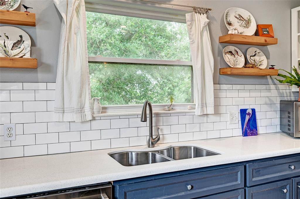 Fresh tile and paint throughout the kitchen