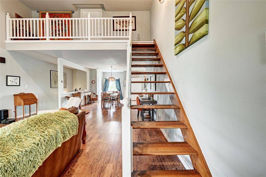 Wooden stairs to the fourth bedroom or office
