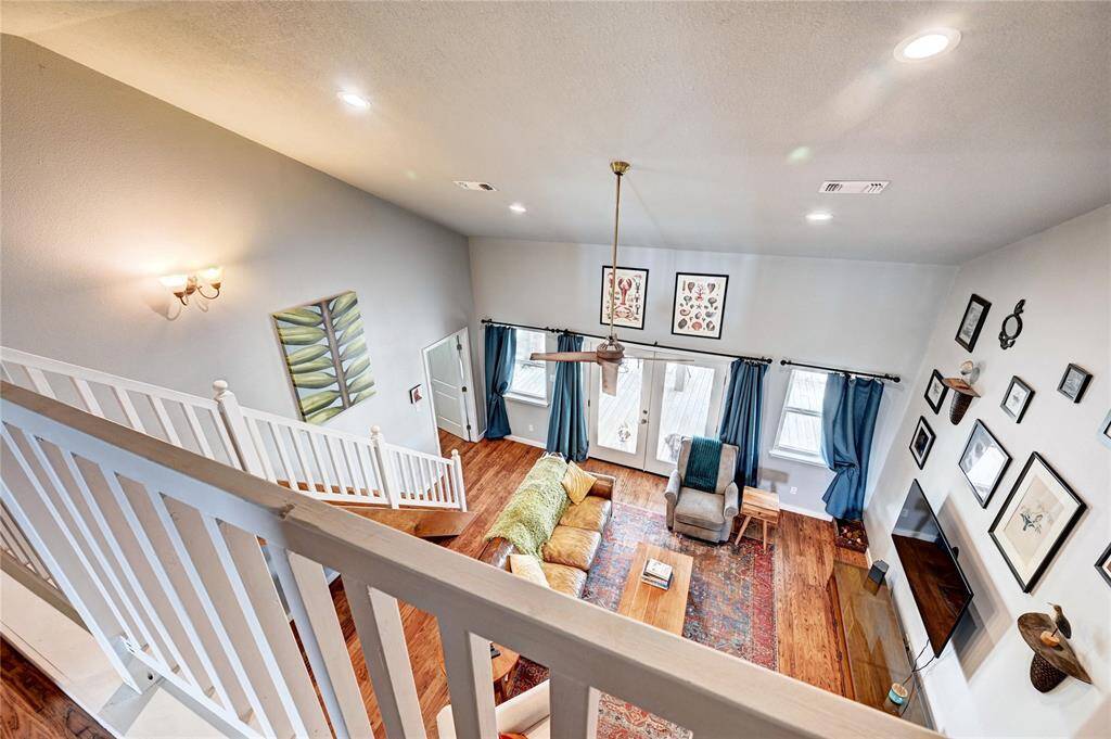 Looking over the living room. Soaring ceilings