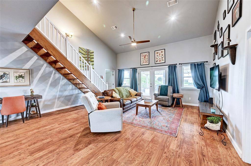 Soaring ceilings. Wood floors.