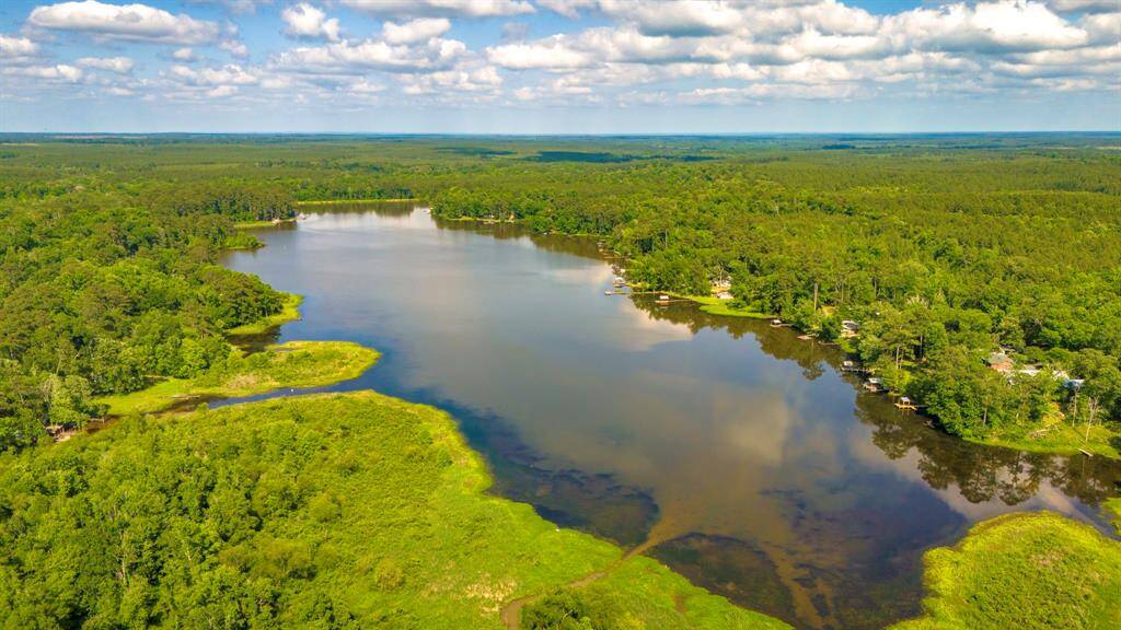 12.36 acres of beautiful East Texas land surrounded by trees, just minutes from Lake Amanda and Lake Tejas