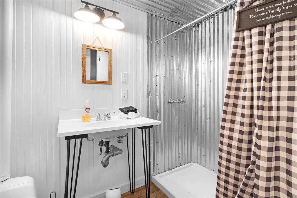 Stylish and functional bathroom with modern plumbing and a composting toilet.