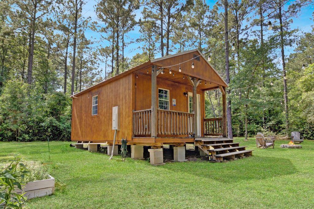 West cabin left at the fork. Tucked into the trees, perfect for short-term rentals or a private retreat.