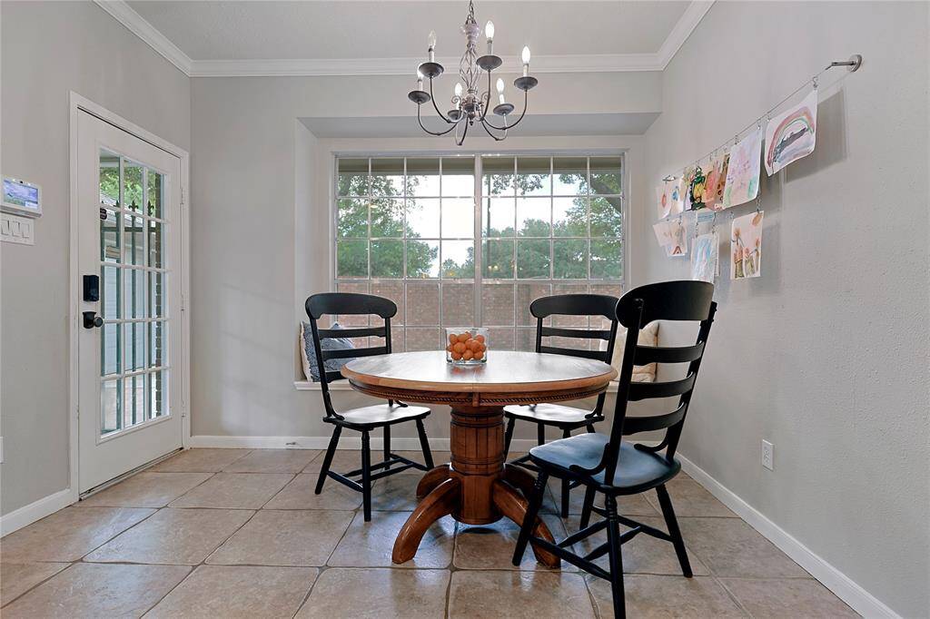 This thoughtfully designed homeseamlessly connects the kitchen witha charming breakfast area.